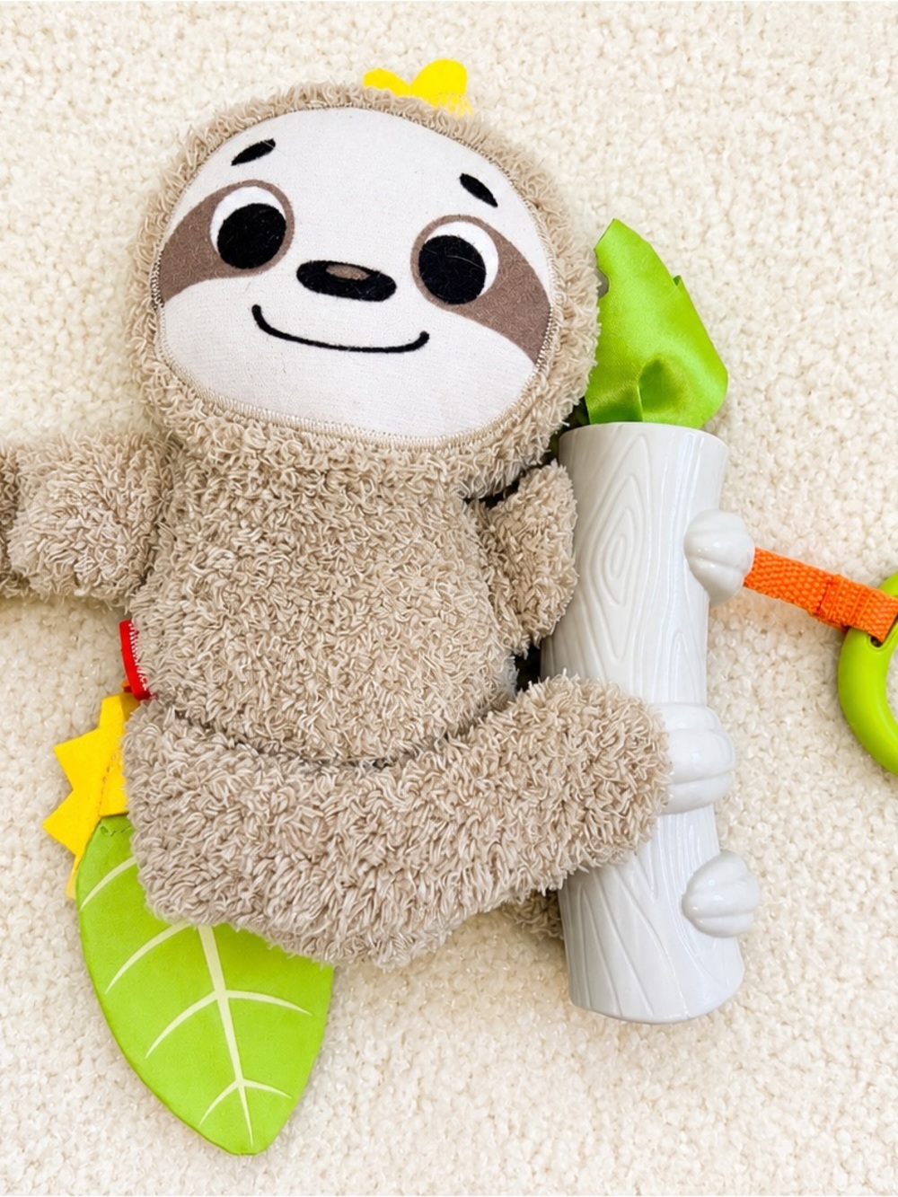 Fisher-Price Beige Sloth Plush with Bright Green Leaf and White Log
